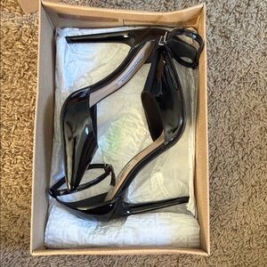 Brand new, never worn Steve Madden black patent leather heels. Size 7.5